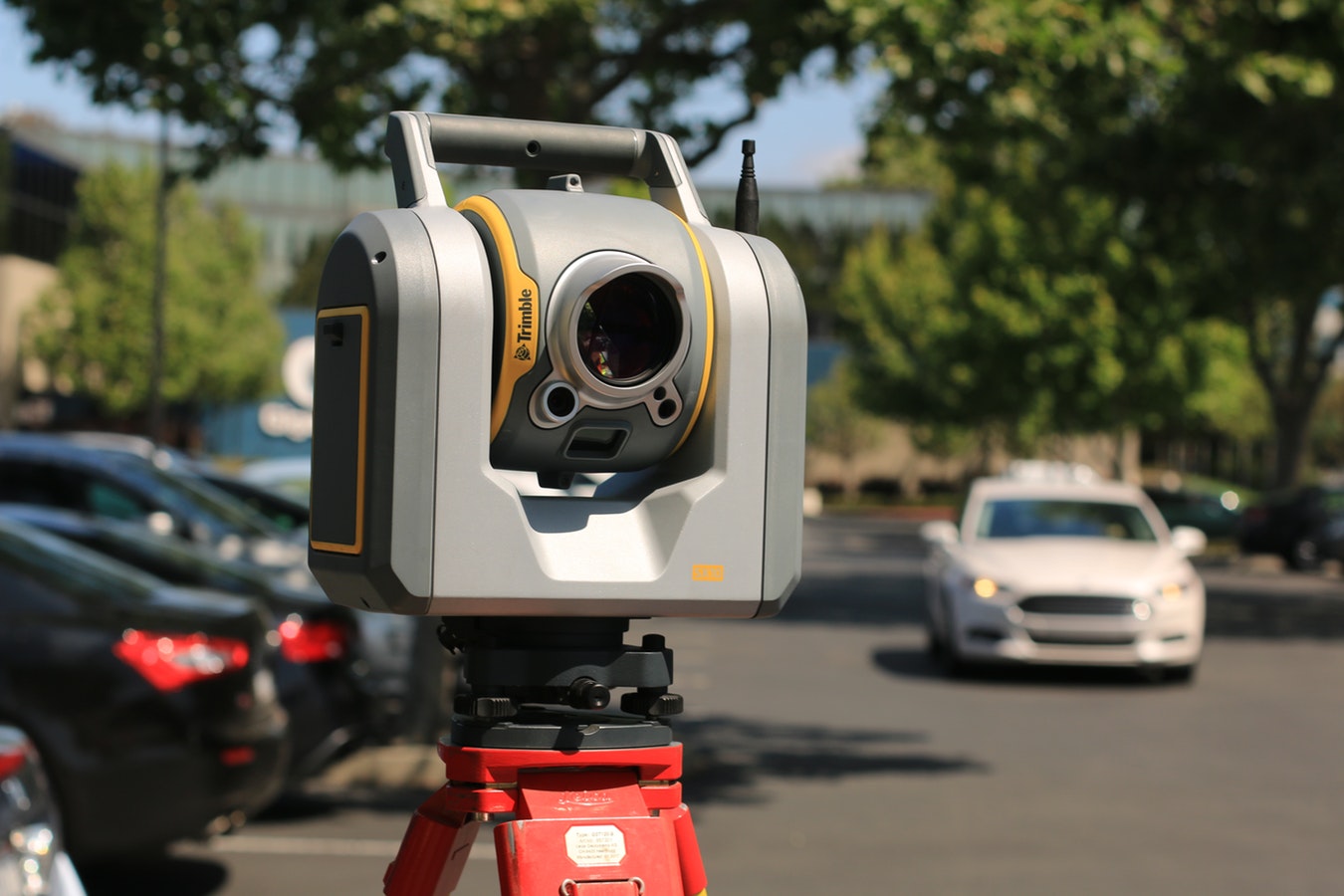 Surveyor's total station set up on site