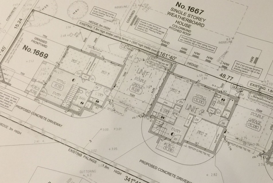 Close-up of detailed architectural blueprints